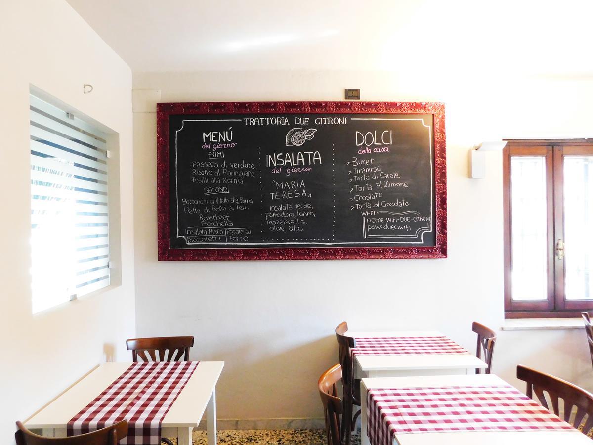 Отель Trattoria Due Citroni Casalgrasso Экстерьер фото